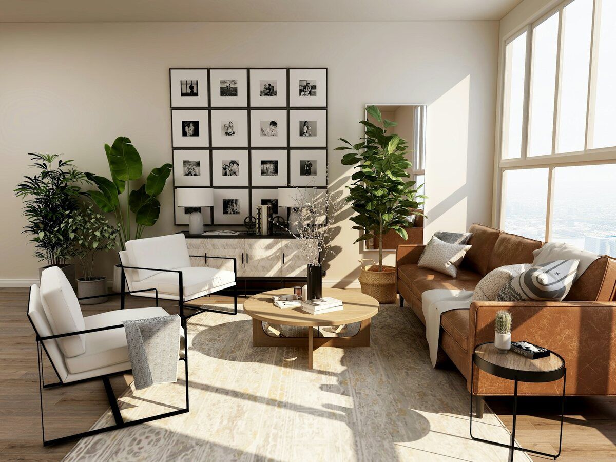 Salón luminoso y ordenado de una vivienda con sofá y plantas